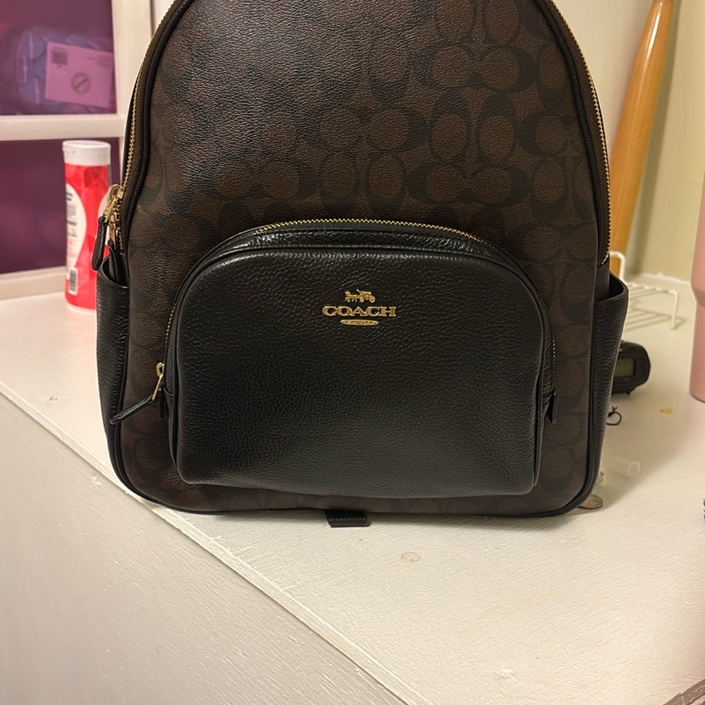 Coach Brown and Black Backpack Sleek Design